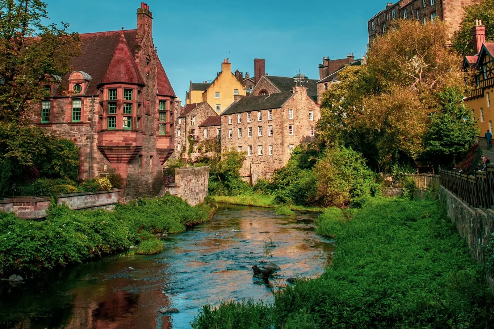 Stone and painted buildings beside the Water of Leith in Edinburgh